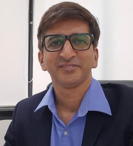Dr. TEJAS SHAH